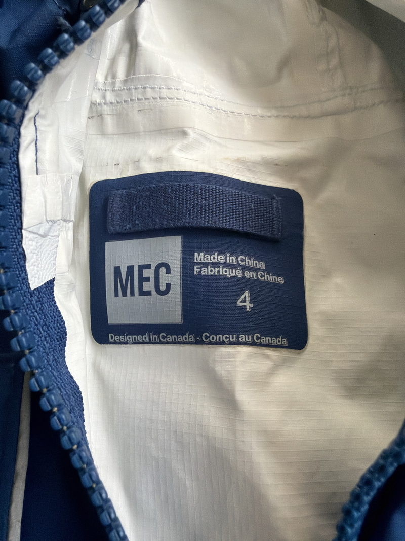Royal blue raincoat — Tag